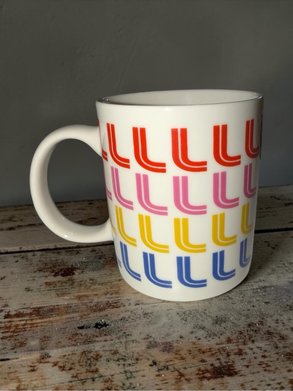 Ashland White Ceramic Mug with Red, Pink, Yellow & Blue L Pattern